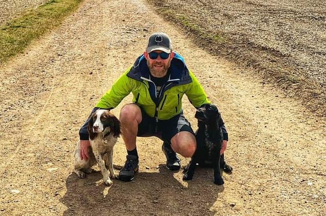Andrew Stockdale with his beloved spaniels