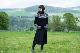 The Traitors III Claudia Winkleman rocks kilt @lekilt, knit @brorafashion and boots @newbottega - picture: BBC ,Studio Lambert, Euan Cherry