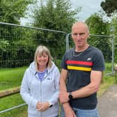 Paul and Debbie Biggadyke beside the now fenced off area of green space so precious to fellow residents of Navigation Close in Melton