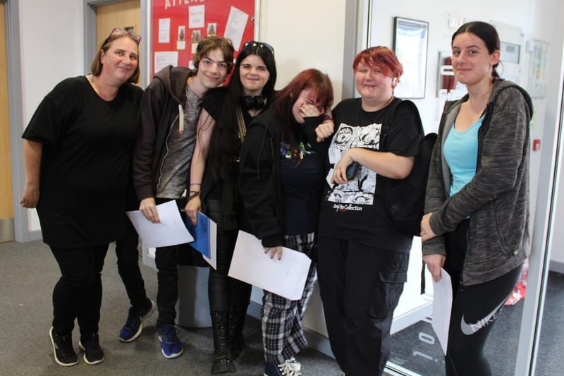 From left to right: Mrs Oates, Harry Faver, Bridie Milligan, Lily Newton, Taylor Green and Zoe Sneath on GCSE results day at John Ferneley College