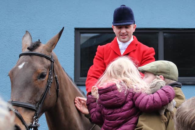 The Quorn Hunt meeting at Melton Livestock Market on New Year's Day
