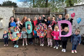 Children and staff at Melton Mowbray Day Nursery and Preschool celebrate their 'good' Ofsted rating