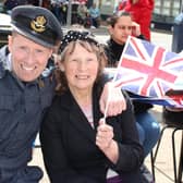 A couple celebrate at the VE Day street party in Melton Mowbray