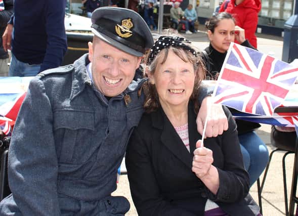 A couple celebrate at the VE Day street party in Melton Mowbray