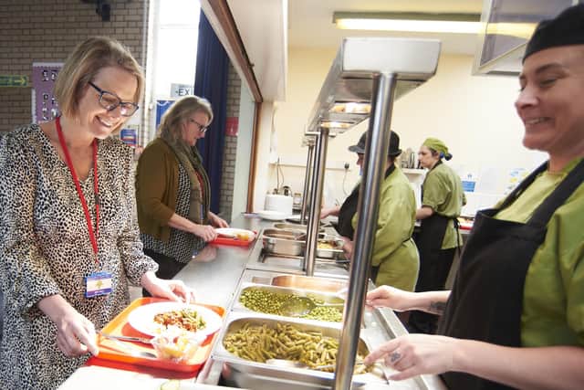 Schools dinners business donors visit Old Dalby School for lunch with pupils and staff