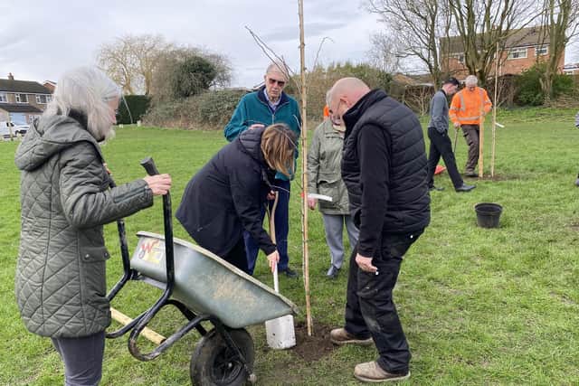 The planting of trees in honour of Bill and Jean Forbes at Melton Country Park