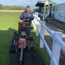 Holwell Sports groundsman Carel Fourie working on the new floodlight bases
