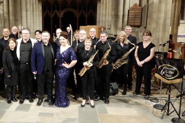 Members of Belvoir Big Band with Miss Lily Lovejoy at Saturday's 1940s music and dance event at St Mary's Church