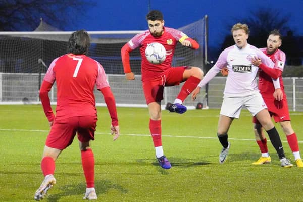 Melton Town, pictured in action against Anstey Nomads before Christmas, host Pinchbeck United on Saturday. Photo by Mark Woolterton.