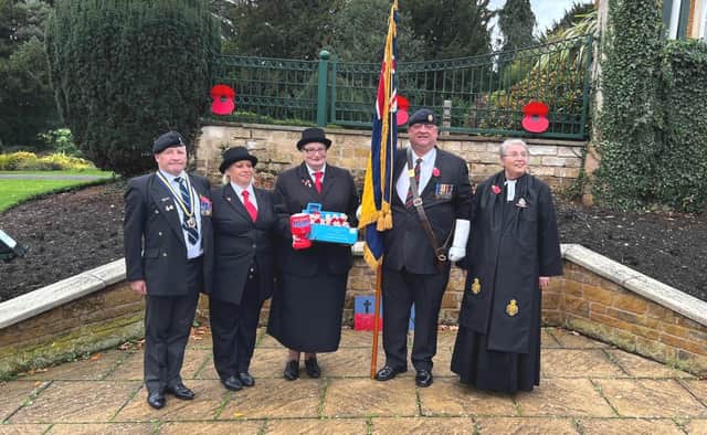 Members of the Melton Mowbray branch of the Royal British Legion, including Poppy Appeal organiser Danny O'Brien, with Rev Pat Olivent-Hayes, at the dedication service on Saturday