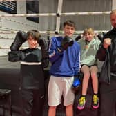 Josh Quailey with some of the youngster at his new Melton boxing club
