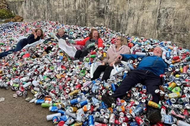 Members of Melton Matters Wombles with some of the aluminium cans they've collected