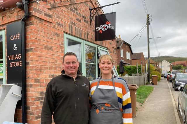 Adam Davies and Louise Rigley outside the shop and cafe at Stathern Garage