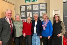 Mayor of Melton, Councillor Alan Hewson, with some of the creators of the Millennium quilt in front of the new canvas replica