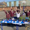 Children from Ash Class celebrate a successful Spring Fair at Somerby Primary School