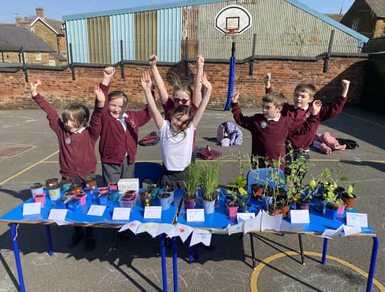 Children from Ash Class celebrate a successful Spring Fair at Somerby Primary School