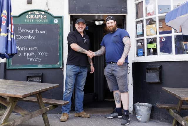 The Grapes' owner, Gav Dowling (left), with his son-in-law, Joe Asman, the new landlord