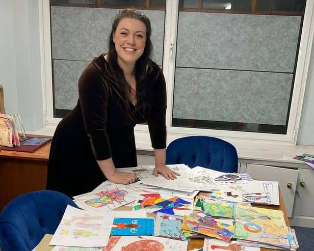 MP Alicia Kearns takes a look at the entries for the annual Christmas card competition last year