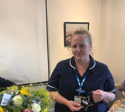 Latham House Medical Practice nurse Sarah Culpan receives her Cavell Star Award