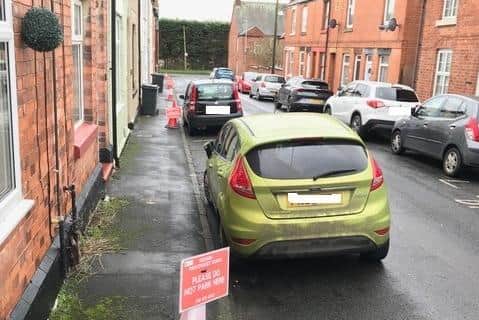 Bishop Street, Melton, with bollards pictured asking residents not to park there while footway repairs are being done this week