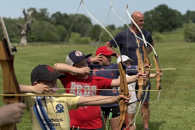 An archery session at a previous BEST summer scheme at Knipton