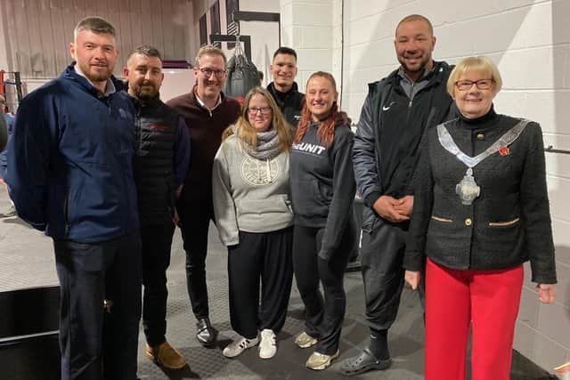 Josh Quailey and Mayor of Melton, Councillor Siggy Atherton, with sponsors of The Unit boxing club