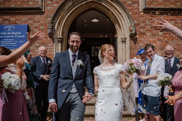 Amelia Coltman on her wedding day in Melton Mowbray with Harry