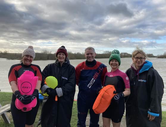 Race Hub founder Johnny Nicol with some of the members enjoying their new base at Frisby Lakes