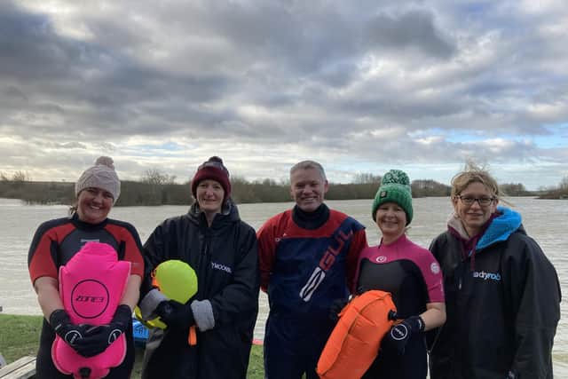 Race Hub founder Johnny Nicol with some of the members enjoying their new base at Frisby Lakes