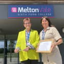 Melton Vale Sixth Form College headteacher Nicki Dartnell and assistant headteacher Natasha Roberts proudly show off the award the college won for it alumni mentoring programme
PHOTO GEORGE ICKE