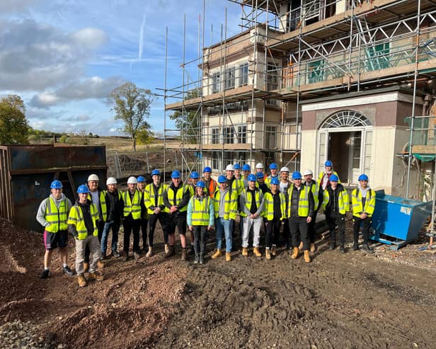 Nottingham Trent University students meet with Steve Bateman, of Grace Homes, at the Sysonby Lodge conversion project