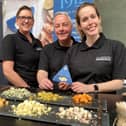 Long Clawson Dairy's stand at last year's Artisan Cheese Fair, with senior brand manager Nicki Matthews (right)