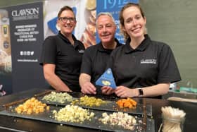 Long Clawson Dairy's stand at last year's Artisan Cheese Fair, with senior brand manager Nicki Matthews (right)