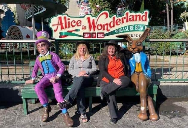 Elsie Peters and Doris Cook pictured back at Blackpool's Pleasure Beach this month 45 years after they had a photo taken at the same spot