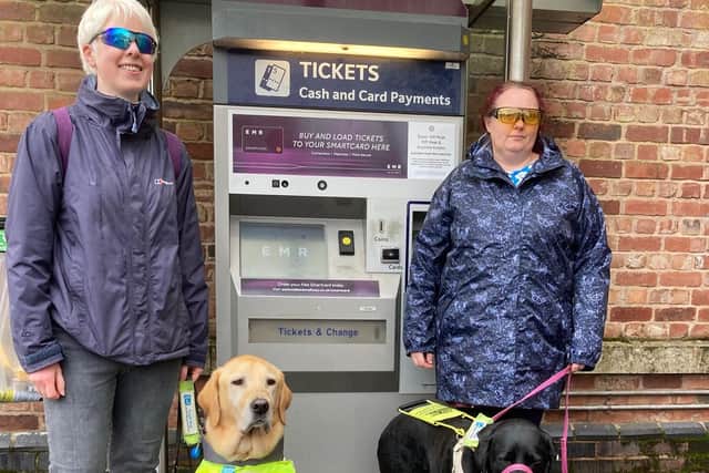 Leonie Seymour-Milsom (right), with guide dog Lisa, and Leigh Pick, with guide dog Geoffrey, are two partially-sighted passengers who will soon have to try to use the ticket vending machines at Melton train station