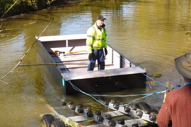 The new MOWS workboat pictured being launched earlier this month, less than a week before it was stolen before being recovered