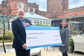 Ragdale Hall Spa managing director, Hugh Wilson, director, Allison Garner, with a cheque for this year's Ragdale Hall Community Chest