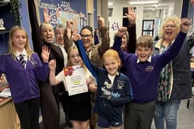 Pupils and staff at Sherard Primary School celebrate being awarded a Melton In Bloom Gold award