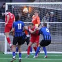 Sam Beaver heads home Melton's fourth goal on Saturday. Photo by Mark Woolterton.