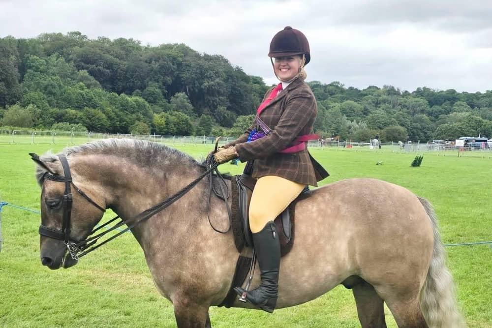 Olivia Kohl riding Highland pony, Valerock Maverick