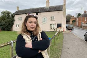 Landlady Jo Towle outside the Crown and Plough at Long Clawson, which is closed after regular flooding