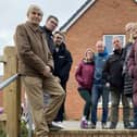 Residents, with ward borough councillor Sarah Cox, at the top of the steps they consider dangerous and unusable for some at Roman Gate in Melton