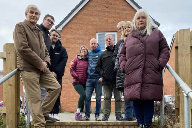 Residents, with ward borough councillor Sarah Cox, at the top of the steps they consider dangerous and unusable for some at Roman Gate in Melton