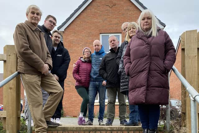 Residents, with ward borough councillor Sarah Cox, at the top of the steps they consider dangerous and unusable for some at Roman Gate in Melton