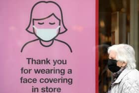 Adults have been warned to stay at home when feeling unwell or wear face coverings in public spaces in order to stem the spread of illness,