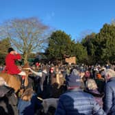 Riders drink from the stirrup cup as hundreds gather for the traditional Melton Mowbray New Year hunt meet