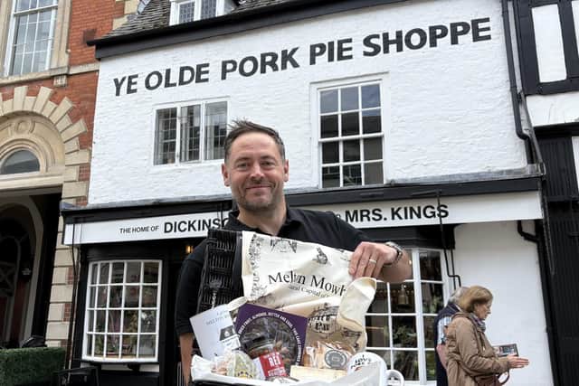 Richard Griffiths, manager of Ye Olde Pork Shoppe, shows off the hamper to be won in our competition