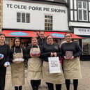 Manager Richard Griffiths with staff members outside the Dickinson and Morris Ye Olde Pork Pie Shoppe