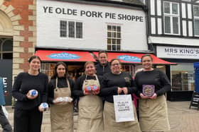 Manager Richard Griffiths with staff members outside the Dickinson and Morris Ye Olde Pork Pie Shoppe