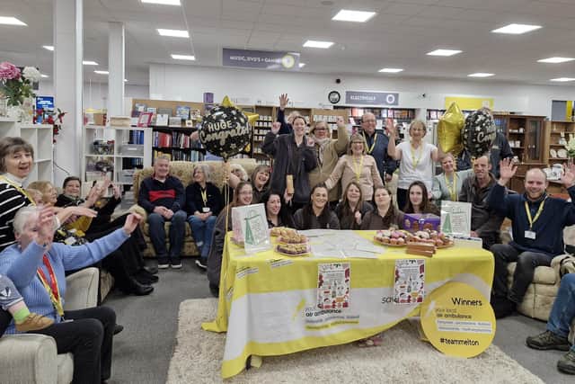 Staff at Melton's The Hanger celebrate winning the award for UK's favourite charity shop